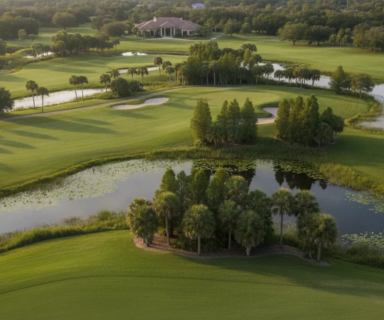 Aerial view of a Florida golf course with palm trees and fairways